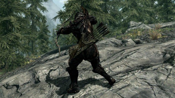 Best Skyrim mods — a Skyrim archer knocks their next arrow, with their quiver hanging from their waist.