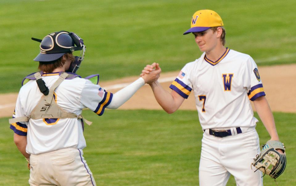 Watertown Post 17 pitcher Treyton Himmerich (right) is congratulated by catcher Mason Krause after a game against Aberdeen during the 2023 American Legion baseball season. Watertown has been named as the host site for the 2025 state Class A American Legion Baseball tournament. Watertown last hosted the tourney in 1991.