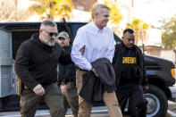 Alex Murdaugh, center, is escorted into the Colleton County Courthouse before his double murder trial in Walterboro, S.C., on Monday, Feb. 6, 2023. (Jeff Blake/The State via AP, Pool)