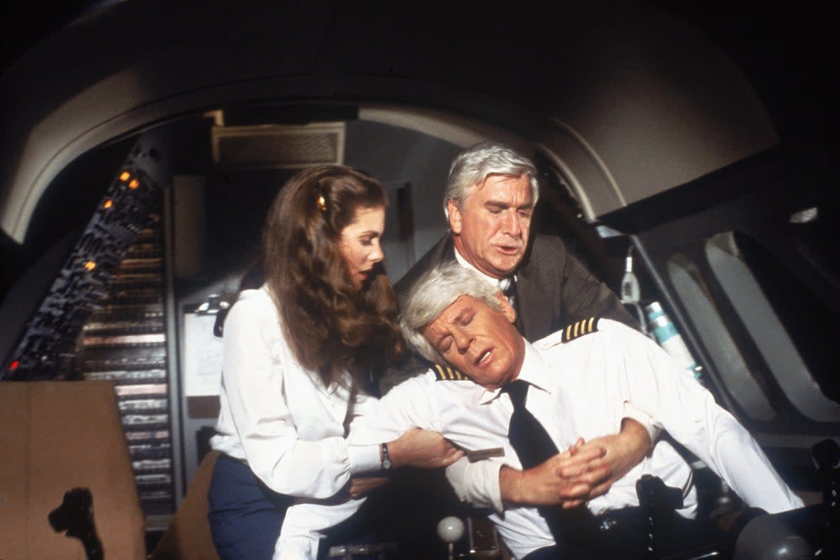 Don’t call me Shirley: Leslie Nielsen alongside Julie Hagerty and Peter Graves in ‘Airplane!' (Paramount)