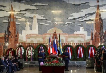 People attend a mourning ceremony and a funeral for Alexei Leonov, the first man to conduct a space walk in 1965, in Mytishchi, outside Moscow