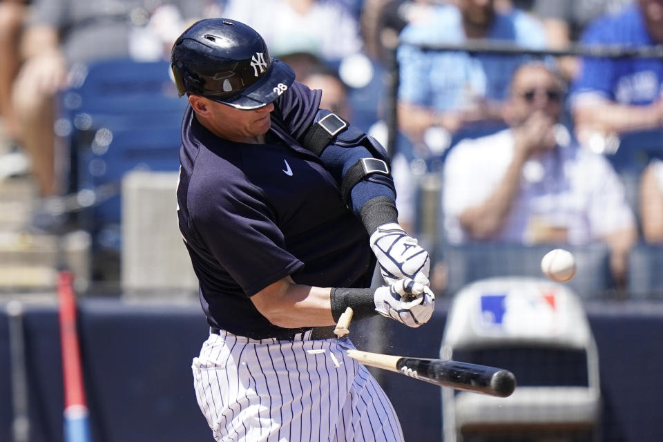 New York Yankees' Josh Donaldson breaks his bat as he flies out during the first inning of a spring training baseball game against the Toronto Blue Jays, Saturday, March 26, 2022, in Tampa, Fla. (AP Photo/Lynne Sladky)