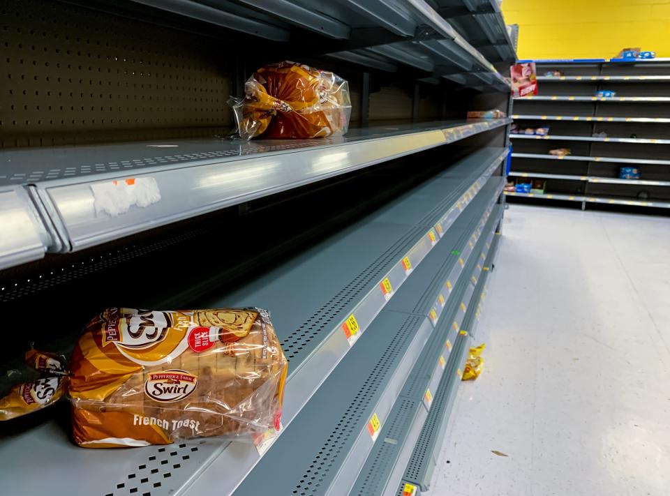 A few loaves remain in the bread isles after customers prepare for hurricane Dorian inside the Walmart on Indiantown Road in Jupiter, Fla.  on Aug. 29, 2019. (Photo: Richard Graulich/The Palm Beach Post via ZUMA Wire)