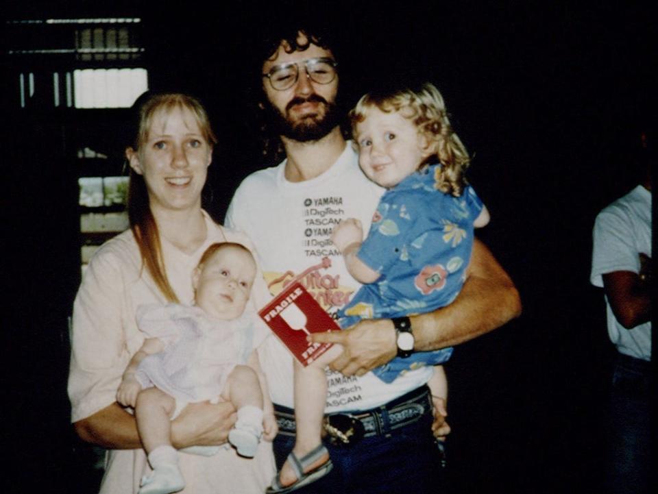 David Koresh and his wife Rachel hold their two children Star and Cyrus in 1987.