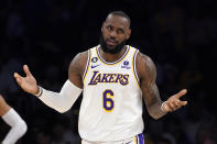 Los Angeles Lakers forward LeBron James gestures to a referee during the first half in Game 3 of an NBA basketball Western Conference semifinal against the Golden State Warriors Saturday, May 6, 2023, in Los Angeles. (AP Photo/Mark J. Terrill)