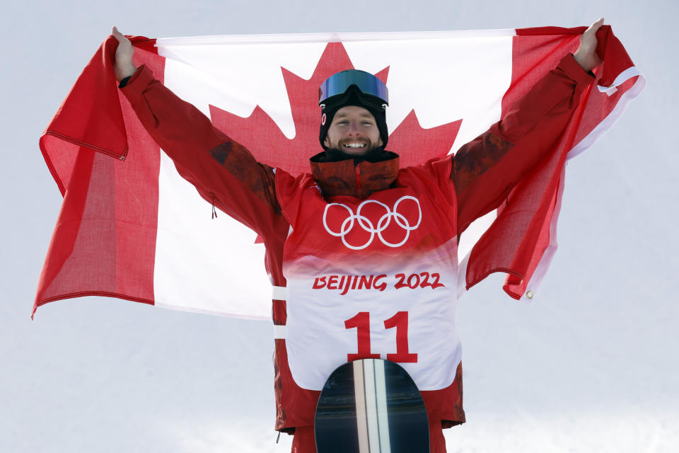 Seen here, Canada's Max Parrot celebrates after winning gold in the men's snowboard slopestyle at the Winter Olympics.