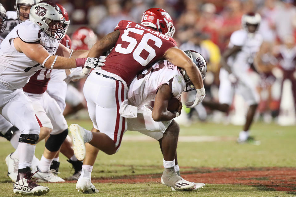 Sep 17, 2022; Fayetteville, Arkansas, USA; Arkansas Razorbacks defensive lineman Zach Williams (56) tackles Missouri State Bears quarterback Jason Shelley (3) in the fourth quarter at Donald W. Reynolds Razorback Stadium. Arkansas won 38-27. Mandatory Credit: Nelson Chenault-USA TODAY Sports