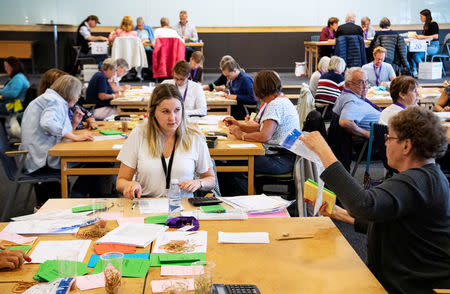 Election officials count ballot papers at a tally centre in Malmo, Sweden September 11, 2018. TT News Agency/Johan Nilsson/via REUTERS