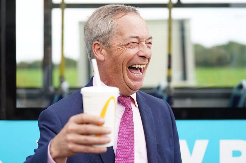 Mr Farage later tried to make light of the pelting, by posing for a photo with a McDonald's milkshake -Credit:PA