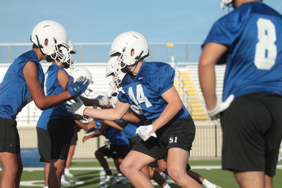 Reagan County High School's Dylan Odom (44) participates in a blocking drill during football workout Monday, Aug. 1, 2022, at James H. Bird Memorial Stadium in Big Lake.