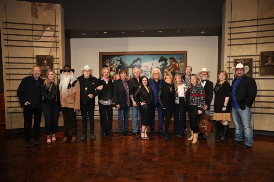 Don Schlitz, Country Music Hall of Fame member; Trisha Yearwood, Co-Host; William Lee Golden, Country Music Hall of Fame member and member of the Oak Ridge Boys; Bobby Bare, Country Music Hall of Fame member; Duane Allen, Richard Sterban and Joseph Bonsall, Country Music Hall of Fame members and members of the Oak Ridge Boys; Tess Frizzell Bishop, granddaughter of Dottie West; Ricky Skaggs, 2018 Country Music Hall of Fame Inductee; Jeannie Seely, Country Music singer and longtime friend of West; Cyndy Gimble, daughter of Johnny Gimble; Kerry West, son of Dottie West; Emily Gimble, granddaughter of Johnny Gimble; Dick Gimble, son of Johnny Gimble; Sarah Trahern, CMA Chief Executive Officer; Garth Brooks, Co-Host and Country Music Hall of Fame member