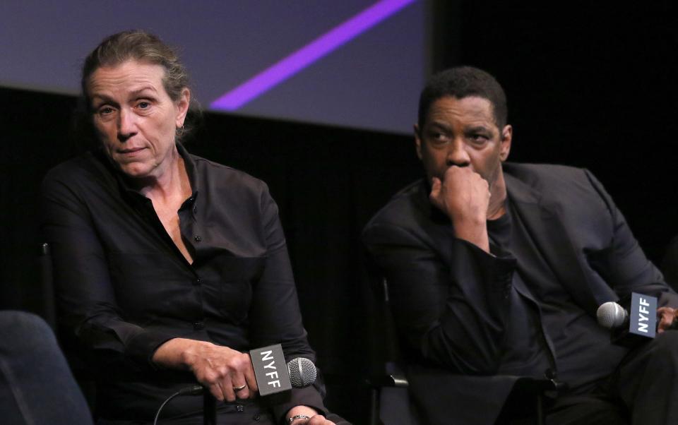 Frances McDormand, left, and Denzel Washington attend a press conference for "The Tragedy of Macbeth," the opening night film of the New York Film Festival.