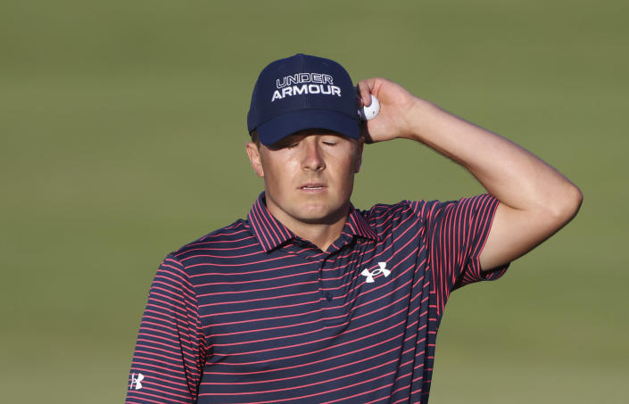 United States' Jordan Spieth reacts after putting on the 18th green during the third round of the British Open Golf Championship at Royal St George's golf course Sandwich, England, Saturday, July 17, 2021. (AP Photo/Ian Walton)