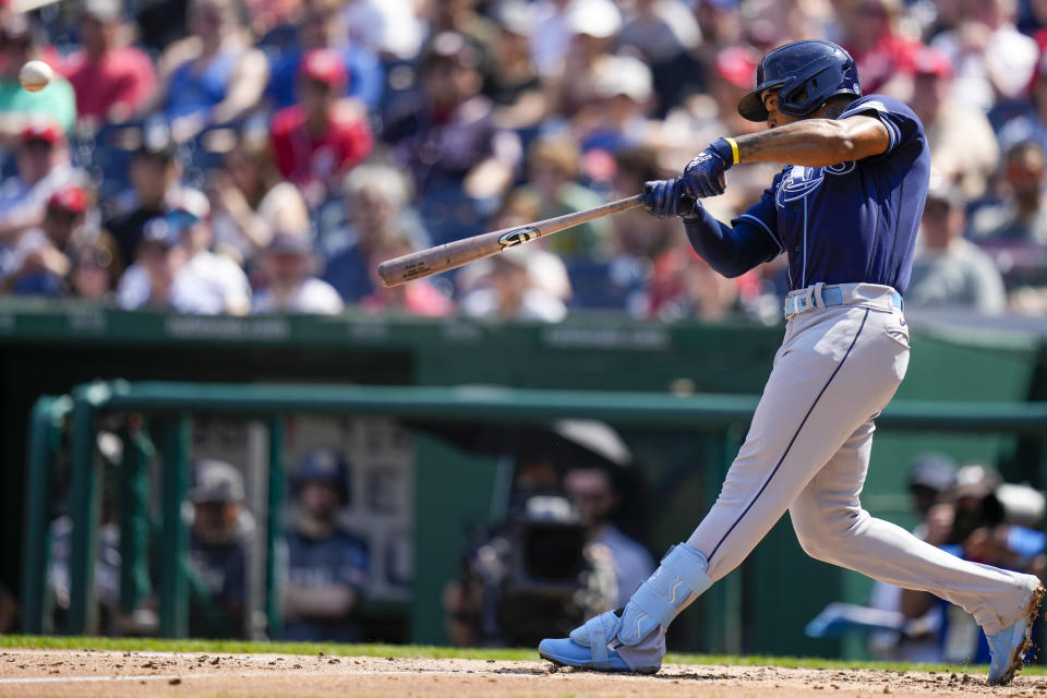 Tampa Bay Rays' Wander Franco hits a two-run homer during the third inning of a baseball game against the Washington Nationals at Nationals Park, Wednesday, April 5, 2023, in Washington. (AP Photo/Alex Brandon)