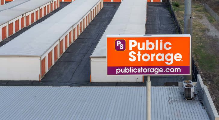 a Public Storage sign in front of a facility of storage buildings