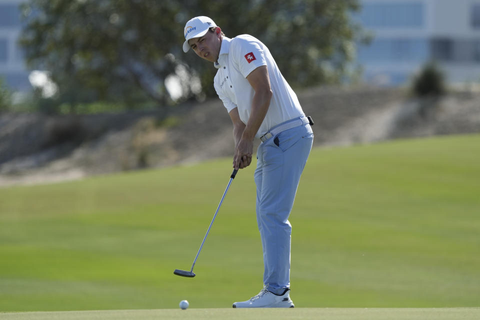 Matt Fitzpatrick, of England, watches his putt on the third green during the third round of the Hero World Challenge PGA Tour at the Albany Golf Club, in New Providence, Bahamas, Saturday, Dec. 2, 2023. (AP Photo/Fernando Llano)