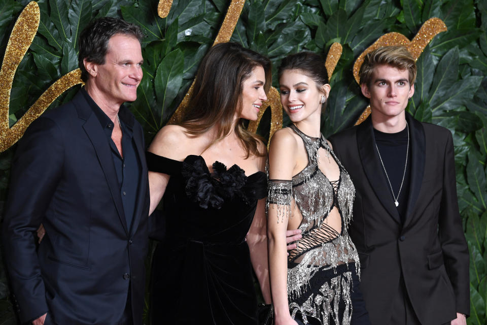 Rande Gerber, Cindy Crawford, Kaia Gerber and Presley Gerber attending the Fashion Awards in association with Swarovski held at the Royal Albert Hall, Kensington Gore, London. Picture Credit Should Read: Doug Peters/EMPICS