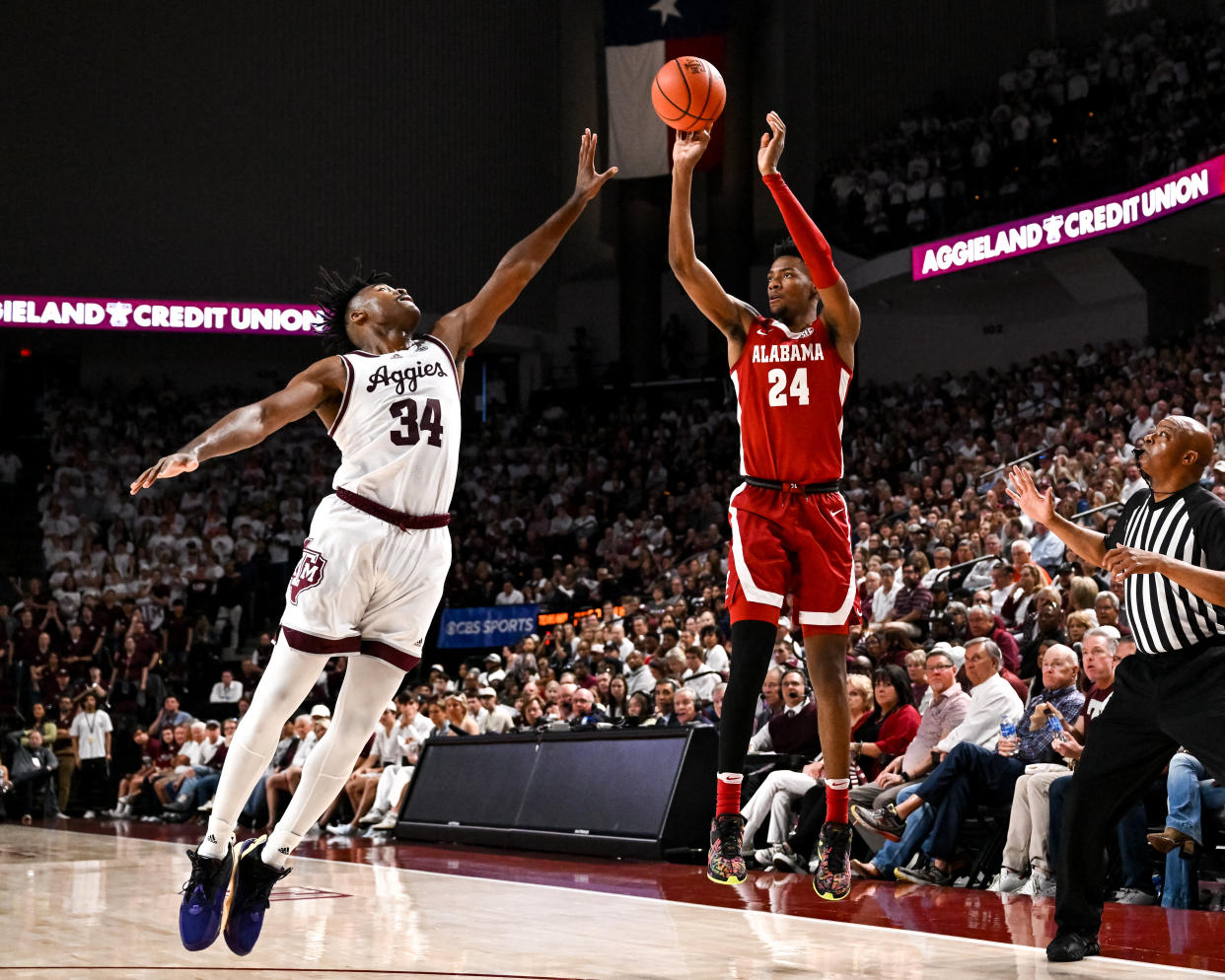 Alabama forward Brandon Miller with a 3-point attempt over Texas A&M forward Julius Marble during their game on March 4, 2023, in College Station, Texas. (Maria Lysaker/USA TODAY Sports)