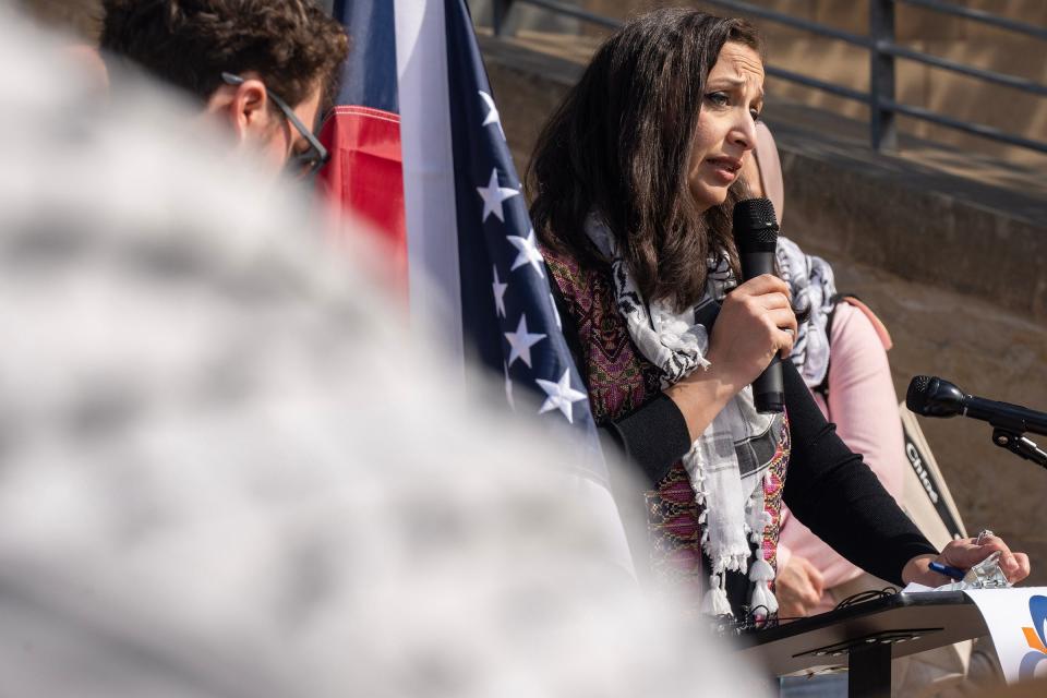 Shaimaa Zayan of CAIR Austin speaks at the City Hall news conference.