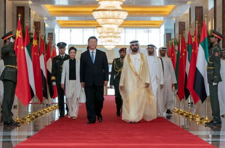 Prime Minister and Vice-President of the United Arab Emirates and ruler of Dubai Sheikh Mohammed bin Rashid al-Maktoum and receive Chinese President Xi Jinping in Abu Dhabi, United Arab Emirates July 19, 2018.WAM/Handout via Reuters