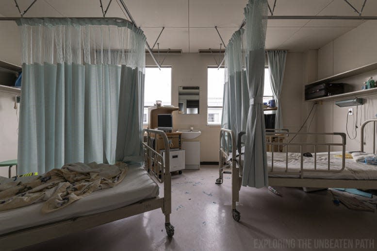 Empty patient beds in an abandoned Fukushima hospital.