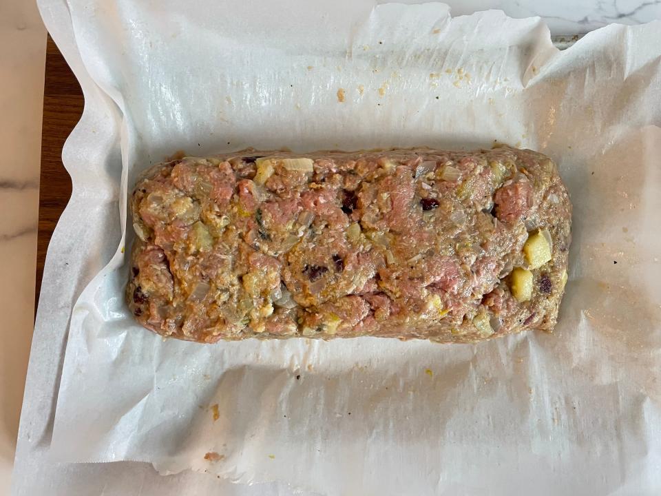 Meat loaf on a baking sheet.