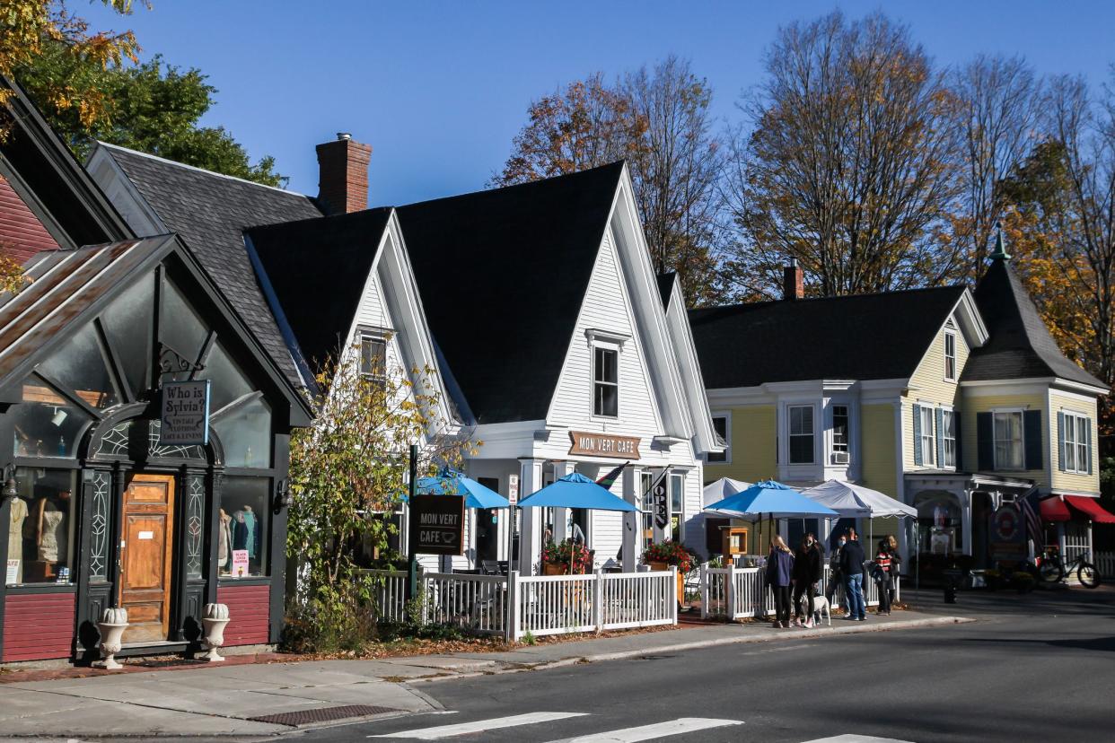 Woodstock, VT, USA - October 9, 2020:People waiting in line upfront Mont Vert Cafe during COVID-19 pandemic