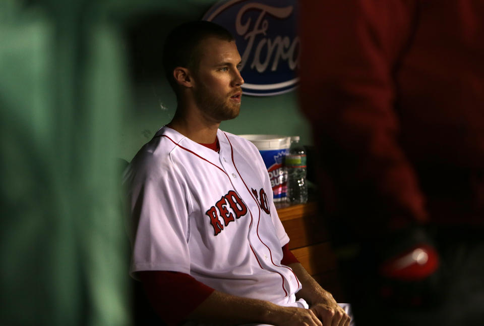 BOSTON - APRIL 27: Boston Red Sox relief pitcher Daniel Bard (#51) sits in the Sox dugout after being unable to throw a strike in the eighth inning.  The Boston Red Sox take on the Houston Astros at Fenway Park. (Photo by Barry Chin/The Boston Globe via Getty Images)