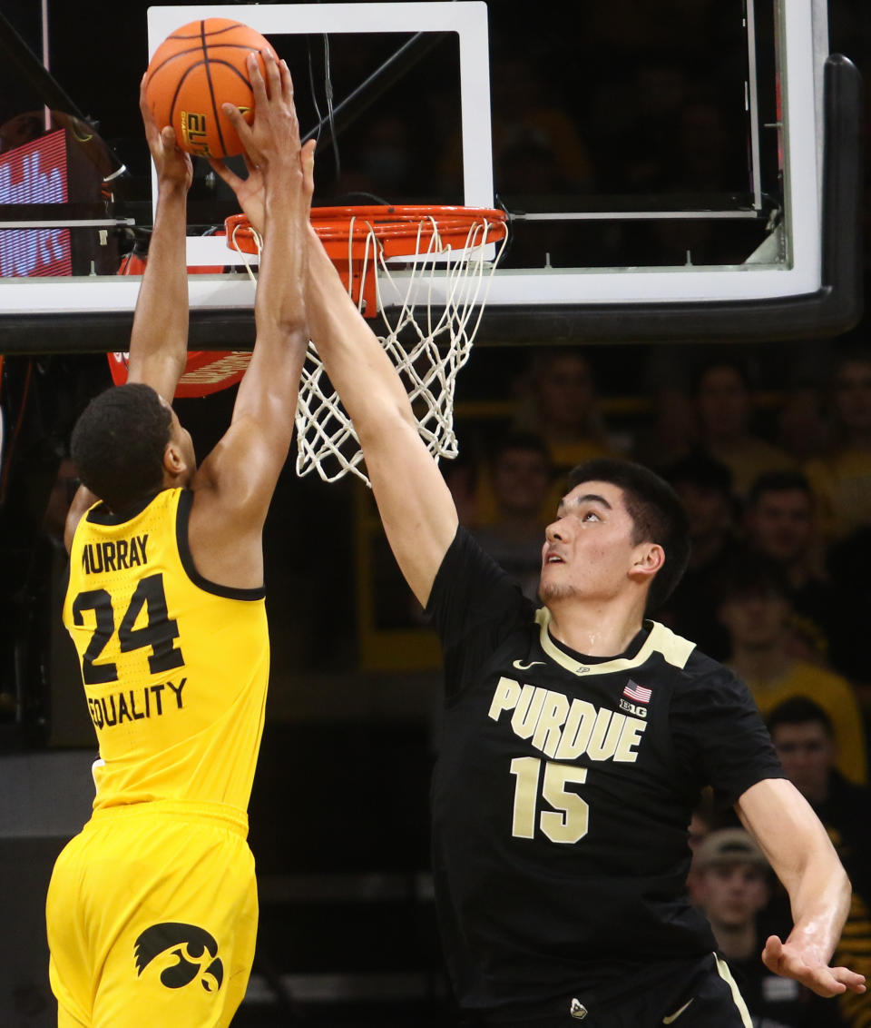 IOWA CITY, IOWA- JANUARY 27: Center Zach Edey #15 of the Purdue Boilermakers blocks a shot during the first half by forward Kris Murray #24 of the Iowa Hawkeyes at Carver-Hawkeye Arena on January 27, 2022 in Iowa City, Iowa.  (Photo by Matthew Holst/Getty Images)