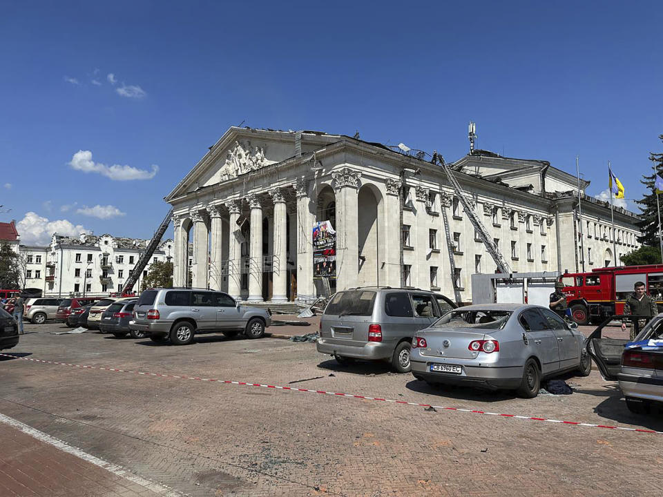 In this photo provided by the Ukrainian Emergency Service, Taras Shevchenko Chernihiv Regional Academic Music and Drama Theatre is seen damaged by Russian attack in Chernihiv, Ukraine, Saturday, Aug. 19, 2023. (Ukrainian Emergency Service via AP)