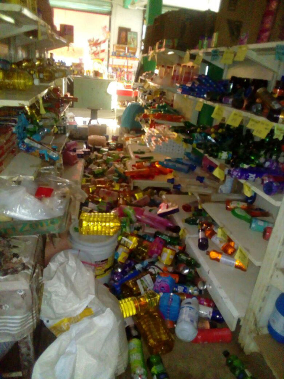 <p>Fallen merchandise is seen on the floor of a shop after an earthquake in Oaxaca, Mexico, Feb. 16, 2018, in this image taken from social media. (Photo: Humberto Ramos via Reuters) </p>