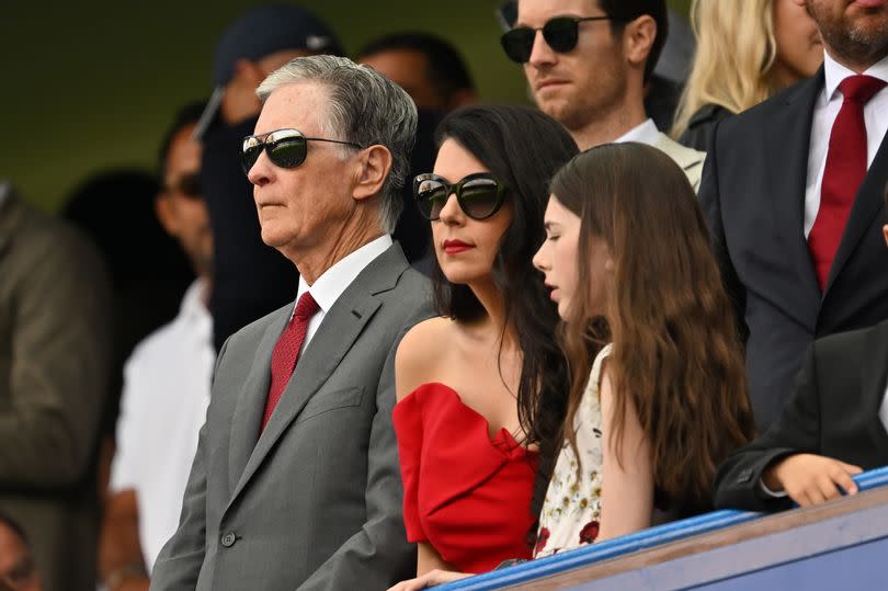 John W. Henry and his family during the Premier League match between Chelsea and Liverpool at Stamford Bridge on August 13, 2023.