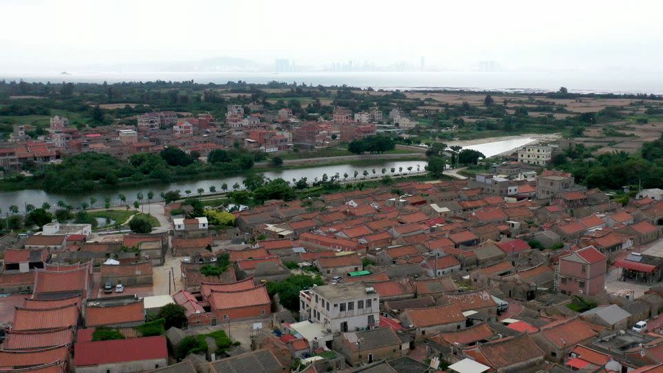 Kinmen's sleepy villages contrast with the skyscrapers of China's Xiamen city just across the water - John Mees/CNN