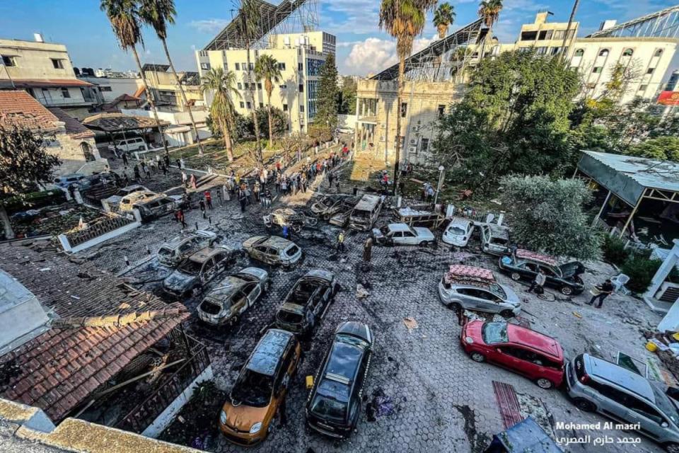A photo taken in Gaza shows the aftermath of a fire in the car park of the Ahli Arab hospital (Mohamed Al-Masri)
