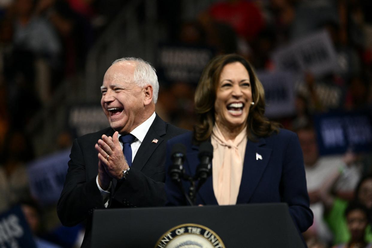 Minnesota Gov. Tim Walz and Vice President Kamala Harris campaign in Philadelphia on Aug. 6, 2024.