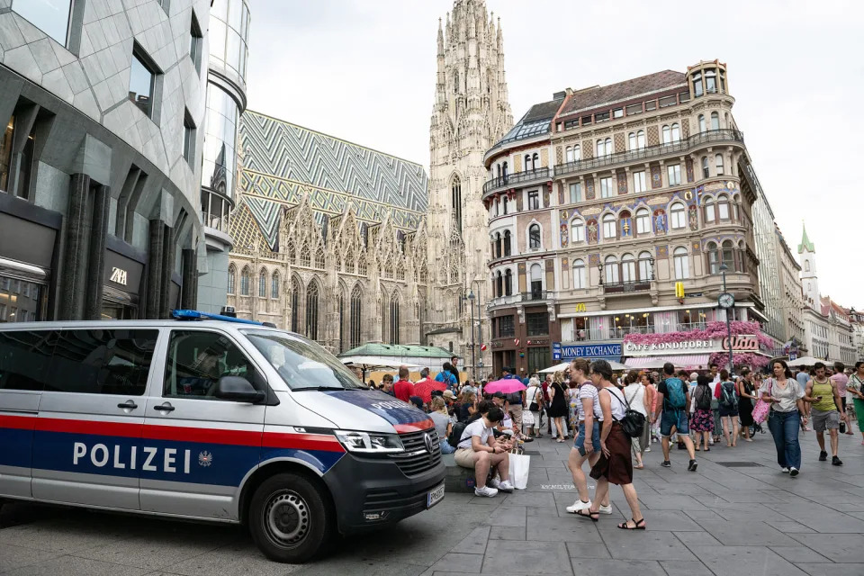 Police guards Stephansplatz as Taylor Swift fans gather to sing together in Vienna, Austria. (Thomas Kronsteiner / Getty Images)