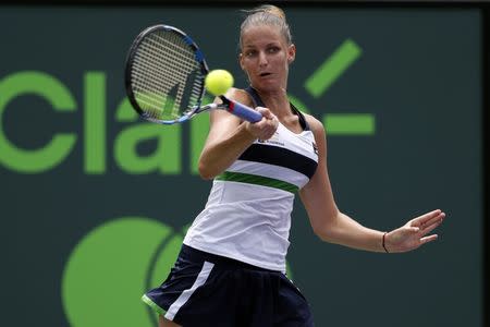 Mar 30, 2017; Miami, FL, USA; Karoilina Pliskova of the Czech Republic hits a forehand against Caroline Wozniacki of Denmark (not pictured) in a women's singles semi-final during the 2017 Miami Open at Crandon Park Tennis Center Geoff Burke-USA TODAY Sports