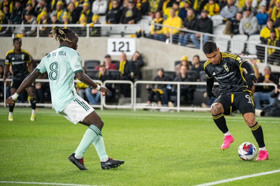 Nov 12, 2023; Columbus, Ohio, USA;
Columbus Crew forward Cucho Hernández (9) keeps the ball from going out of bounds against Atlanta United midfielder Tristan Muyumba (8) during game three of their series on Sunday, Nov. 12, 2023 at Lower.com Field.