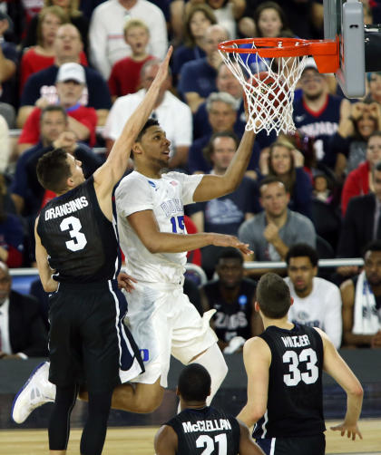 Jahlil Okafor (15) shoots against Gonzaga guard Kyle Dranginis. (USA TODAY Sports)