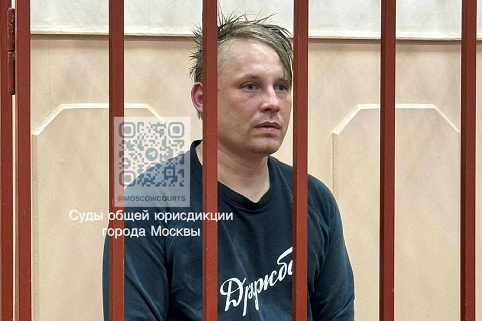 In this photo released by Basmanny District Court press service, Russian journalist Konstantin Gabov attends a hearing at a court in Moscow, on Saturday, April 27, 2024, after his arrest on “extremism” charges, which he denied. (Basmanny District Court press service via AP)