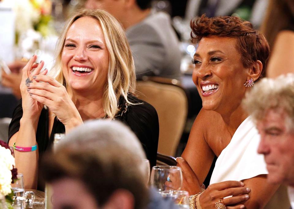 Robin Roberts (R) and Amber Laign speaks onstage at Point Foundation's Point Honors gala at The Beverly Hilton Hotel on October 1, 2016 in Beverly Hills, California