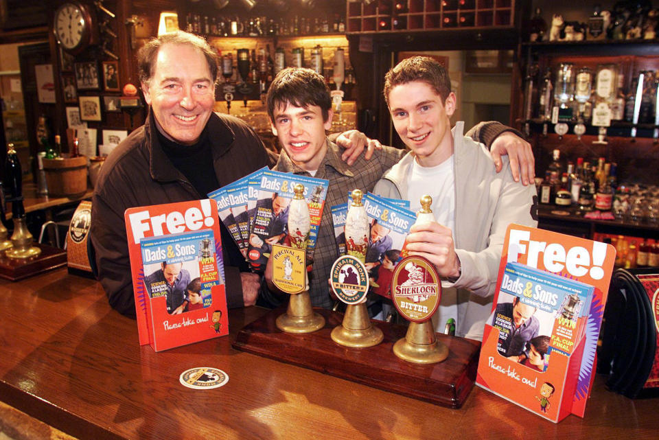 Emmerdale's Jack Sugden, played by Clive Hornby with his two on-screen sons Robert, played by Karl Davies (R) and Andy, played by Kelvin Fletcher at the Woolpack during the launch of the Dad's and Son's Campaign on the Emmerdale set in Leeds.  * The Sugden family are backing the Department for Education and Skills' campaign to encourage dads to take an active role in their sons' education.   (Photo by PA Images via Getty Images)