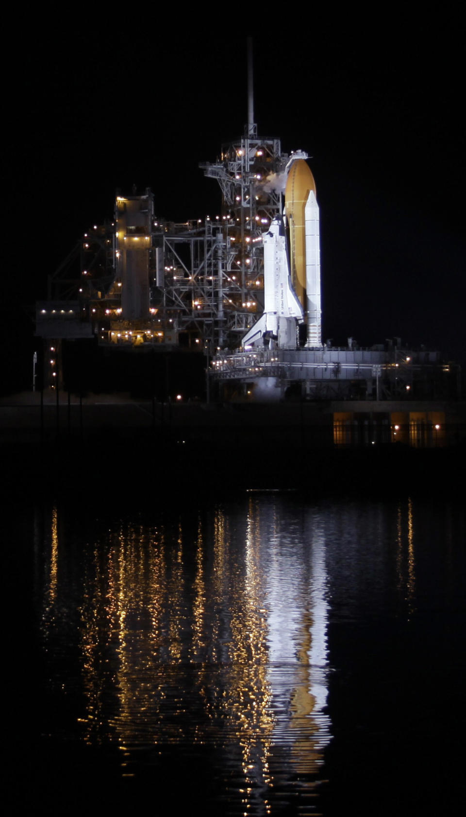 FILE - In this Monday Aug. 24, 2009 file photo, space shuttle Discovery is mounted on pad 39A at the Kennedy Space Center at Cape Canaveral, Fla., for a launch to deliver supplies and equipment to the International Space Station. Dormant for nearly six years, Launch Complex 39A at NASA’s Kennedy Space Center should see its first commercial flight on Feb. 18, 2017. A SpaceX Falcon 9 rocket will use the pad to hoist supplies for the International Space Station. (AP Photo/Chris O'Meara)