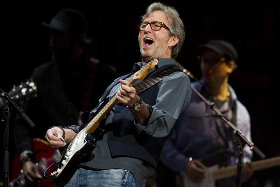 Eric Clapton performs at Eric Clapton's Crossroads Guitar Festival 2013 at Madison Square Garden on Sunday, April 14, 2013, in New York. (Photo by Charles Sykes/Invision/AP)