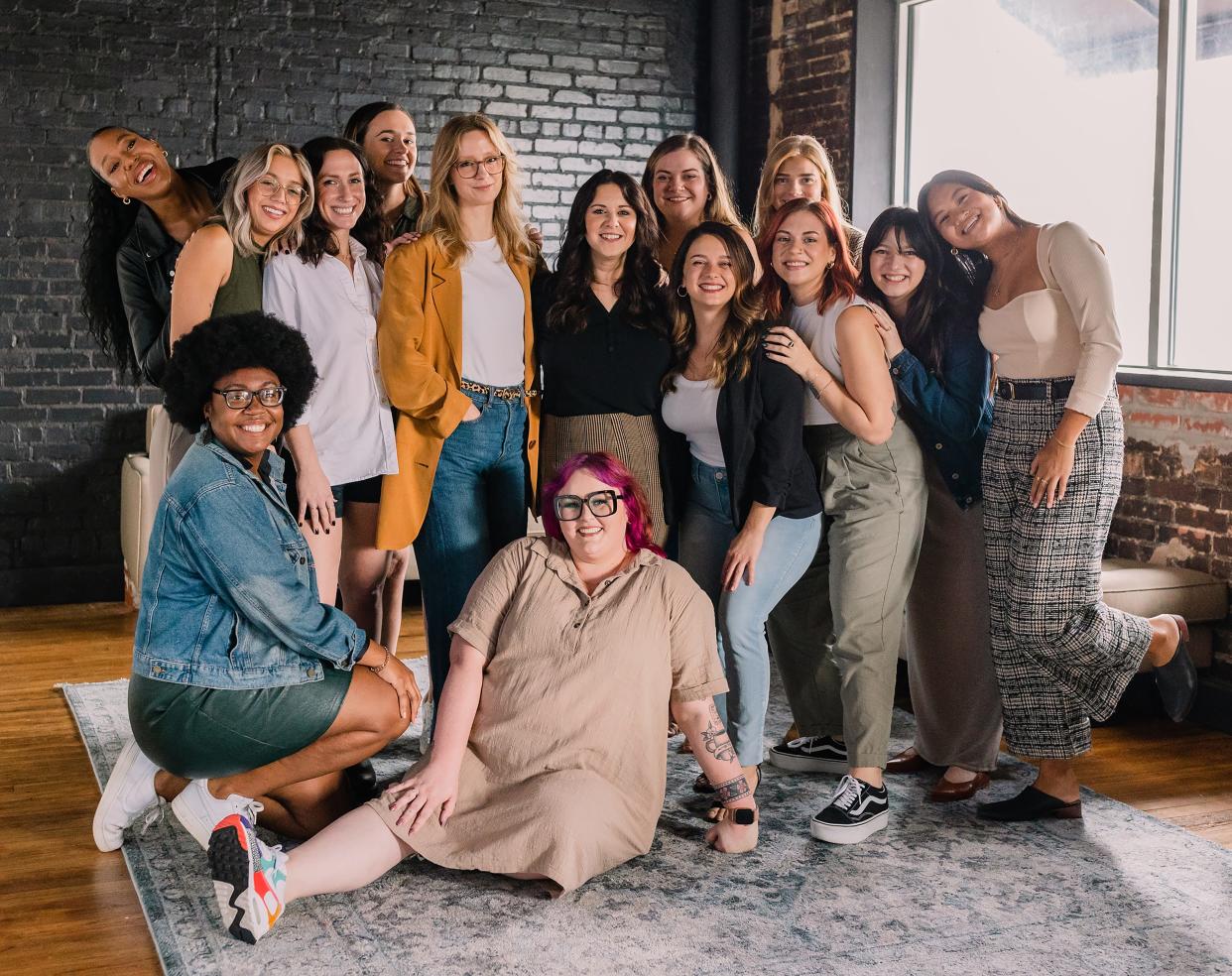 In November 2022, Chelsea DuDeVoire Careccia (standing center, wearing black) posed in Jacksonville with a mix of staff, board, members and social media followers of Each is Every, the women's group she launched a few months later.