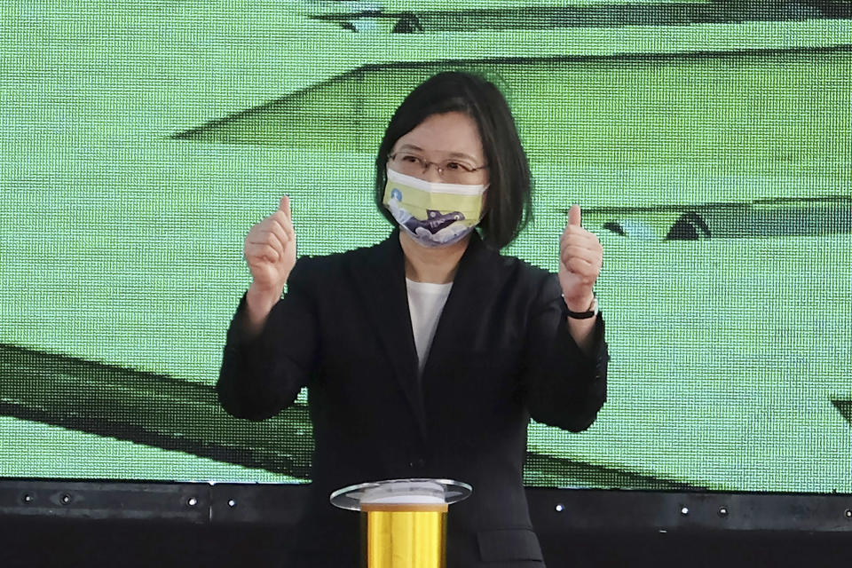 Taiwan's President Tsai Ing-wen gestures during a ceremony to inaugurate the production of domestically-made submarines at CSBC Corp's shipyards in the southern city of Kaohsiung, Taiwan on Tuesday, Nov. 24, 2020. The move marks a step forward for the island's defense strategy at a time of elevated tensions with China. (AP Photo/Huizhong Wu)