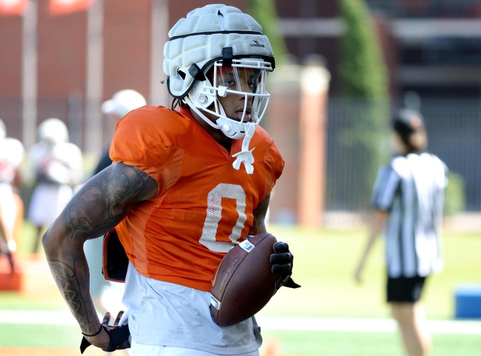 Oklahoma State's Ollie Gordon II waits to do a drill during an Oklahoma State University Cowboys spring football practice.