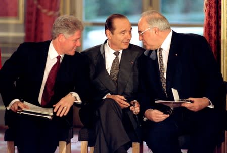 FILE PHOTO: File photo of US President Bill Clinton, French President Jacques Chirac and German Chancellor Helmut Kohl at the Elysee Palace in Paris