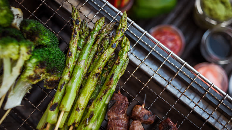 Charred asparagus on a wire rack