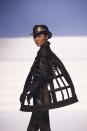 A model wears a creation for the final Jean Paul Gaultier Haute Couture Spring/Summer 2020 fashion collection presented Wednesday Jan. 22, 2020 in Paris. Fashion icon Gaultier presented his final couture catwalk collection, the designer's only remaining runway show since putting an end to his ready to wear collections in 2014. (AP Photo/Francois Mori)